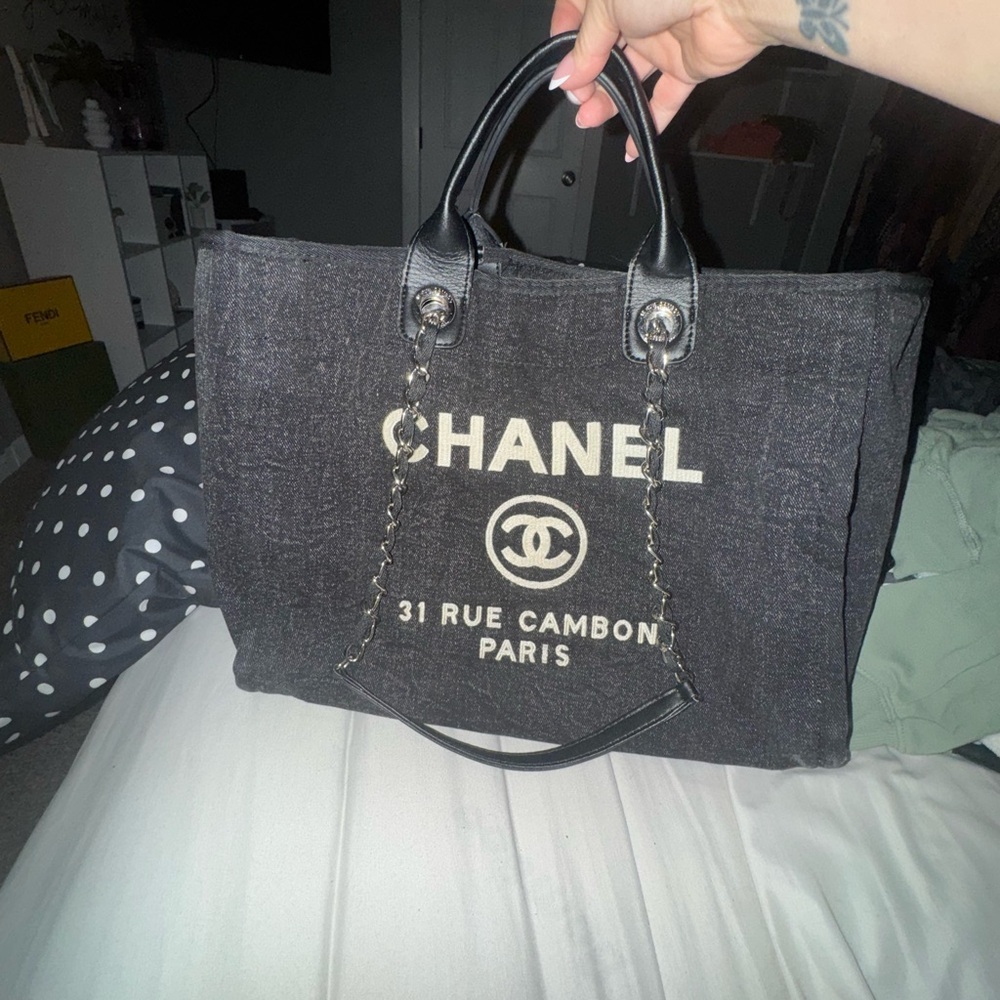 Black Tote with Iconic Logo and Spacious Design